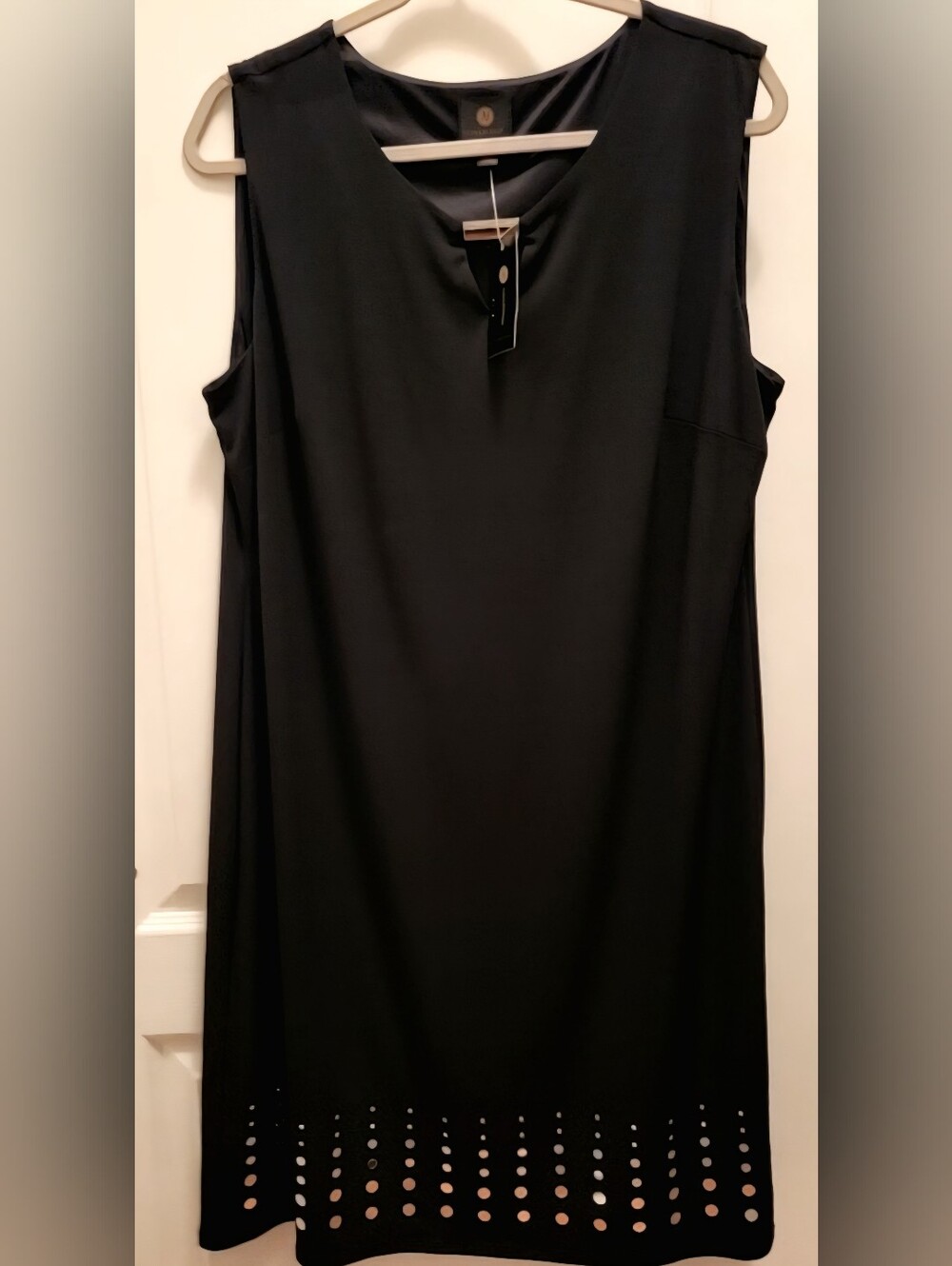 Classic Black Sleeveless Shift Dress with Laser-Cut Hem. NWT